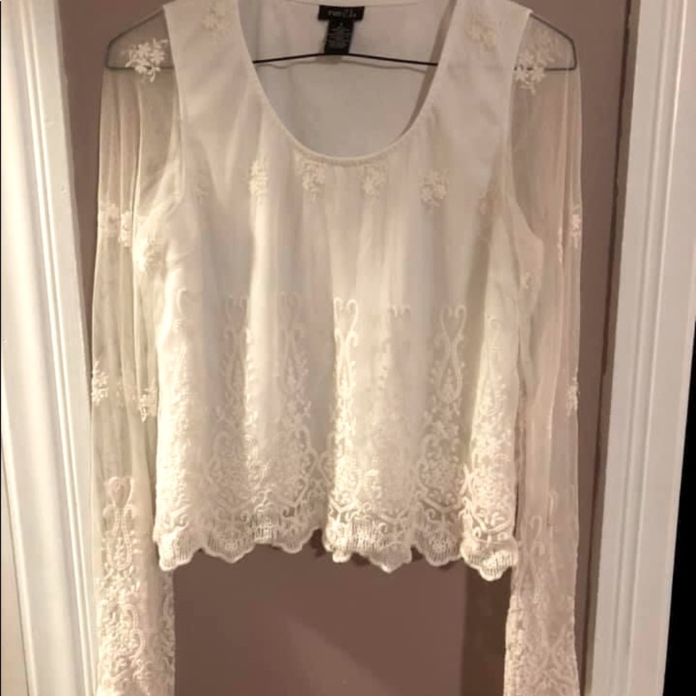 Lace bell sleeve top.